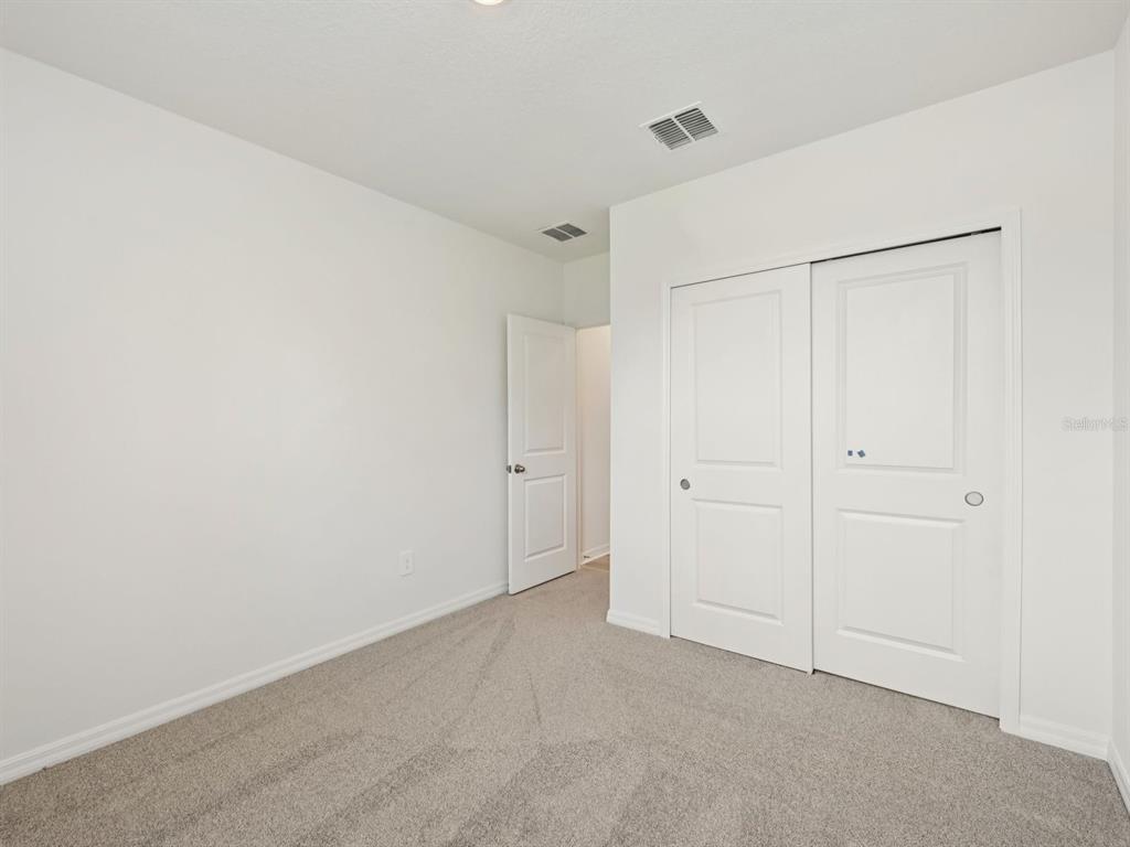 7628 Satterfield Terrace Parrish, FL 34219 - Photo 21 of 25 a view of an empty room