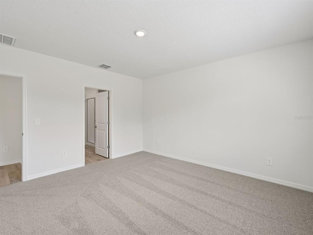 7628 Satterfield Terrace Parrish, FL 34219 - Photo 23 of 25 a view of an empty room