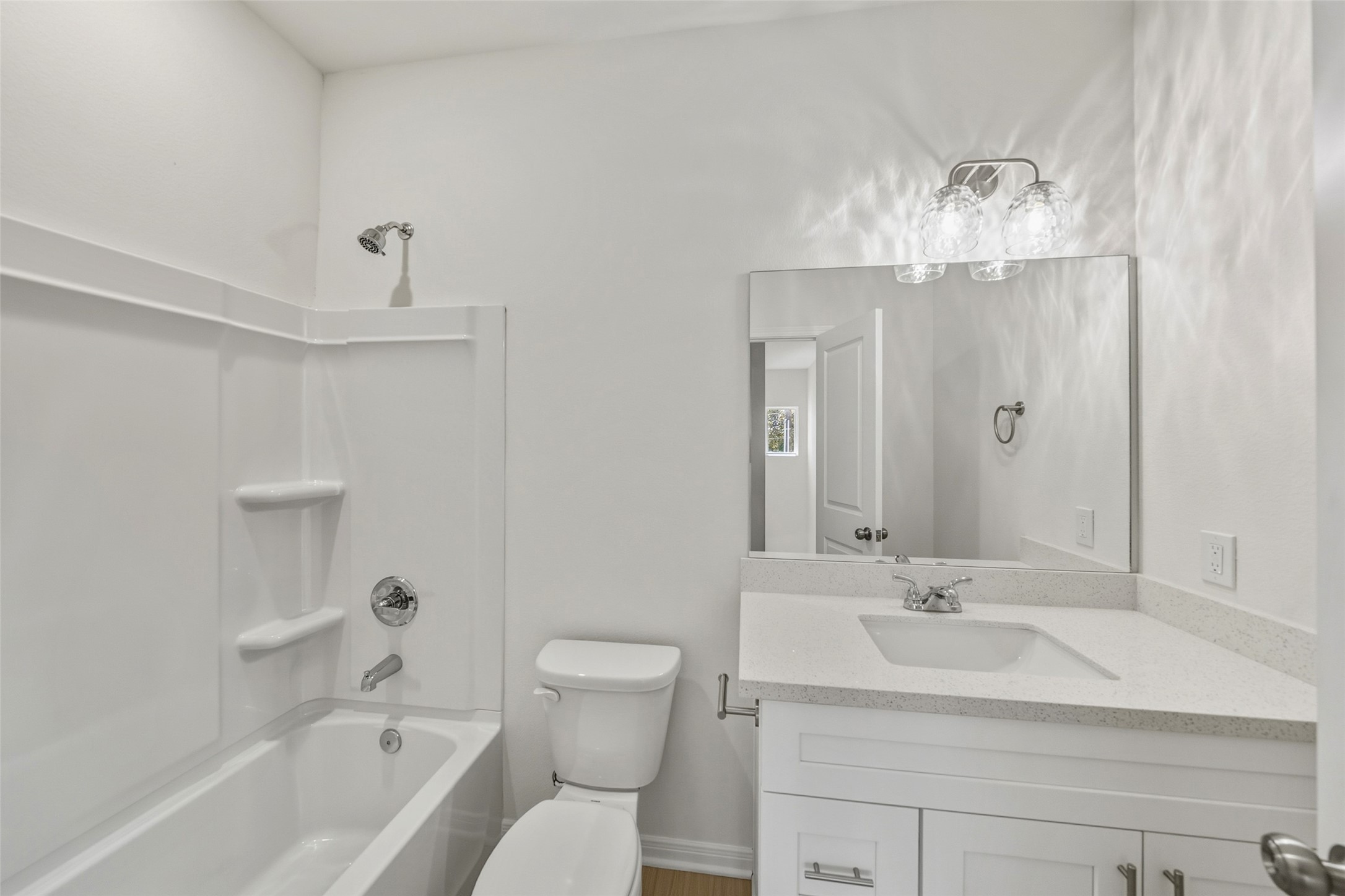 716 West Dallas Street Conroe, TX 77301 - Photo 19 of 24 a bathroom with a sink a toilet and shower