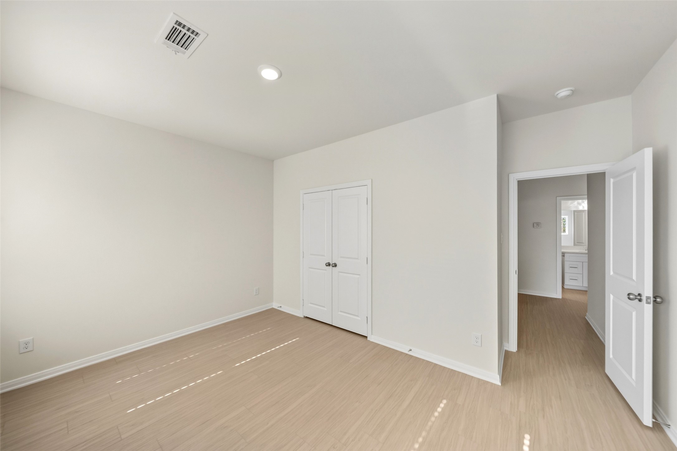 716 West Dallas Street Conroe, TX 77301 - Photo 21 of 24 a view of a room with wooden floor