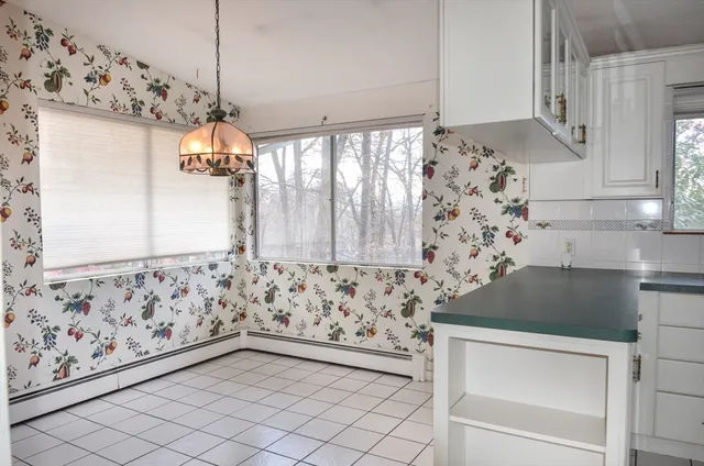 a view of bathroom with bathtub and shower