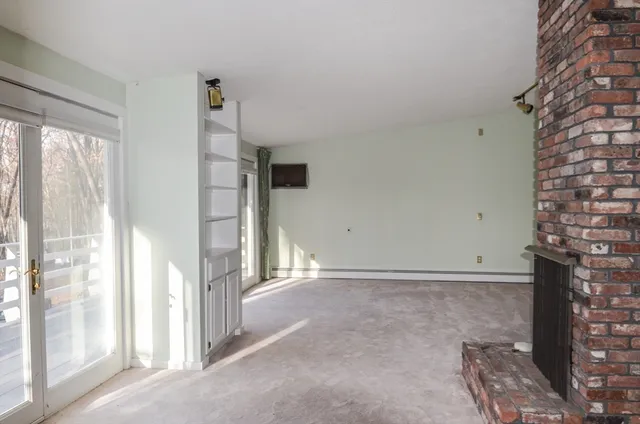 a view of livingroom with hardwood floor and window