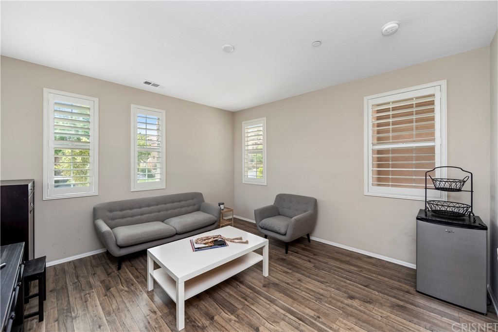 28504 Farrier Drive Valencia, CA 91354 - Photo 40 of 45 a living room with furniture and a window