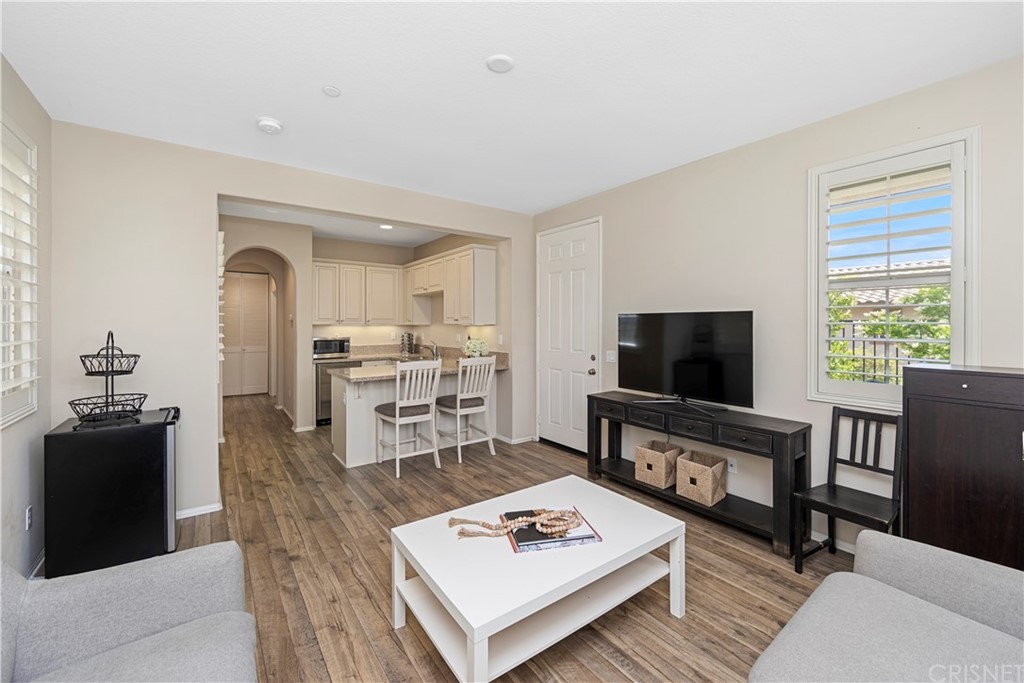 28504 Farrier Drive Valencia, CA 91354 - Photo 41 of 45 a living room with furniture and a flat screen tv