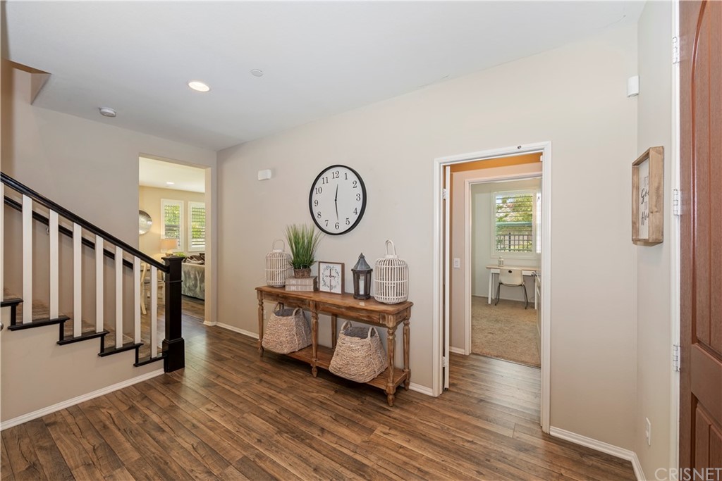 28504 Farrier Drive Valencia, CA 91354 - Photo 10 of 45 a very nice looking room with wooden floor and a large window