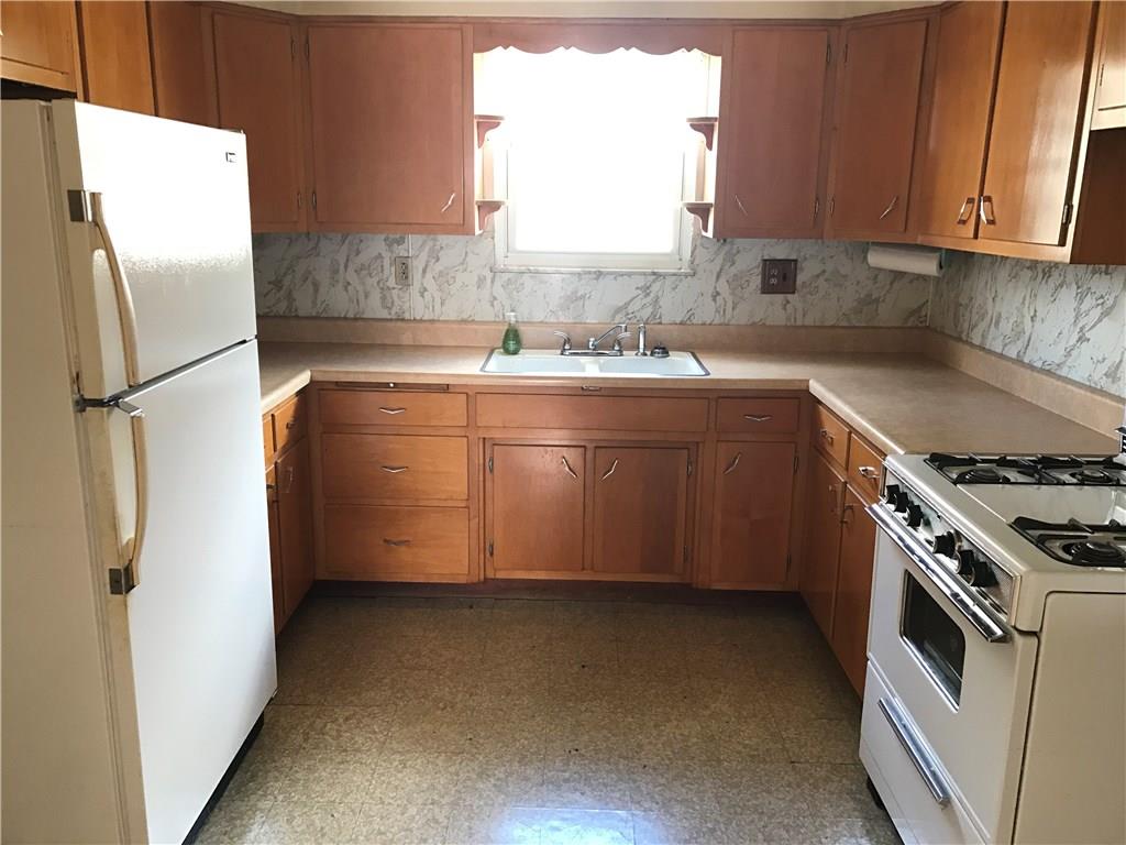The kitchen is light and bright and ready for the new homer to make that first dinner.