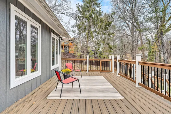 a view of a two chairs on the roof deck