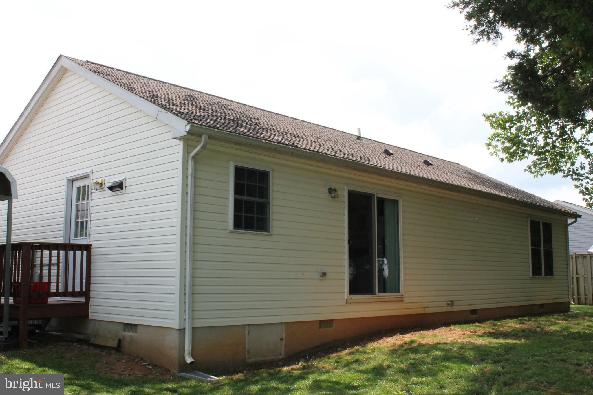 209 Robelei Drive Ranson, WV 25438 - Photo 24 of 30 a view of a house with a yard
