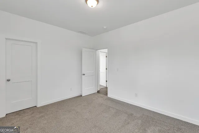 a front view of a house with a swimming pool