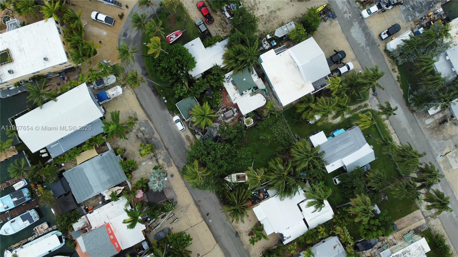 77 South Conch Avenue Marathon, FL 33050 - Photo 5 of 10 an aerial view of a house swimming pool and outdoor seating