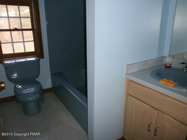 113 Wendell Road East Stroudsburg, PA 18301 - Photo 9 of 10 a bathroom with a sink and a toilet