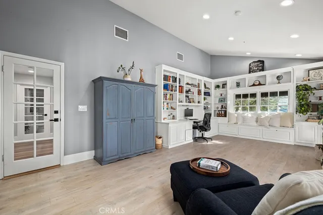 a front view of a house with a yard and a garage
