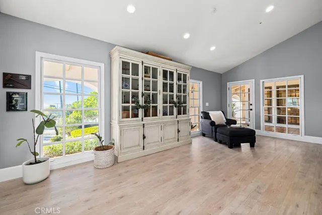a front view of a house with a yard and a garage