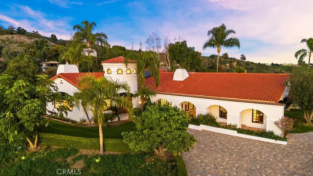 a living room with furniture large window and outer view