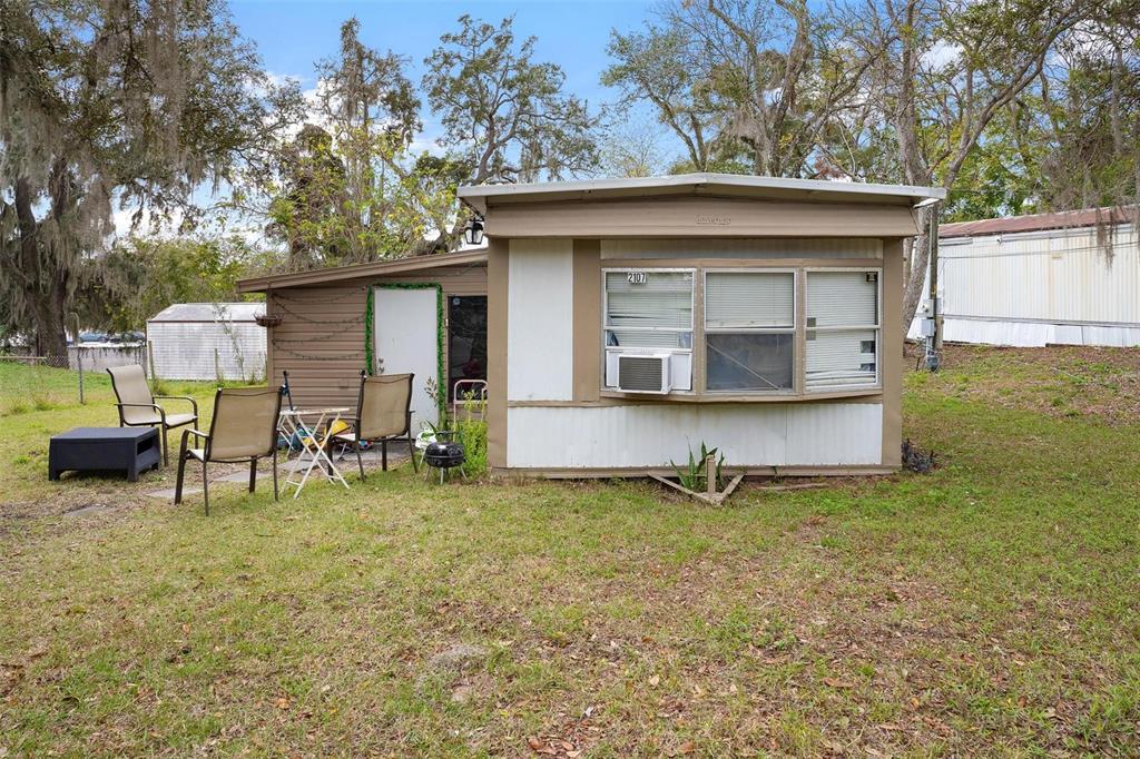 2107 Hialeah Avenue Leesburg, FL 34748 - Photo 3 of 10 a view of a house with backyard and patio