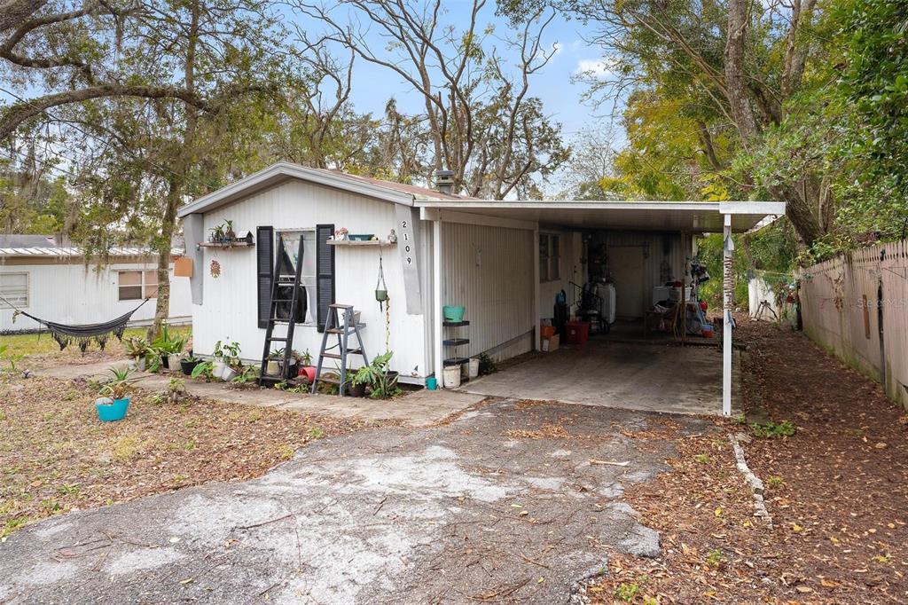 2107 Hialeah Avenue Leesburg, FL 34748 - Photo 8 of 10 a view of a house with a patio
