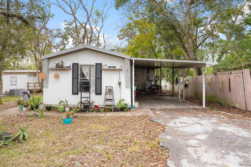 2107 Hialeah Avenue Leesburg, FL 34748 - Photo 9 of 10 a front view of a house with garden