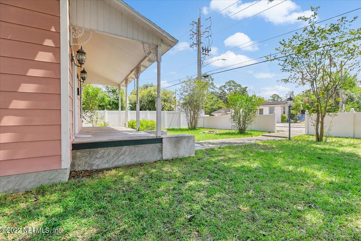 3404 St Augustine Road Jacksonville, FL 32207 - Photo 2 of 16 a view of a backyard with a garden and plants