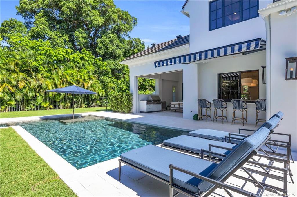 44 South Beach Road Hobe Sound, FL 33455 - Photo 63 of 73 a view of outdoor space yard deck patio and fire pit