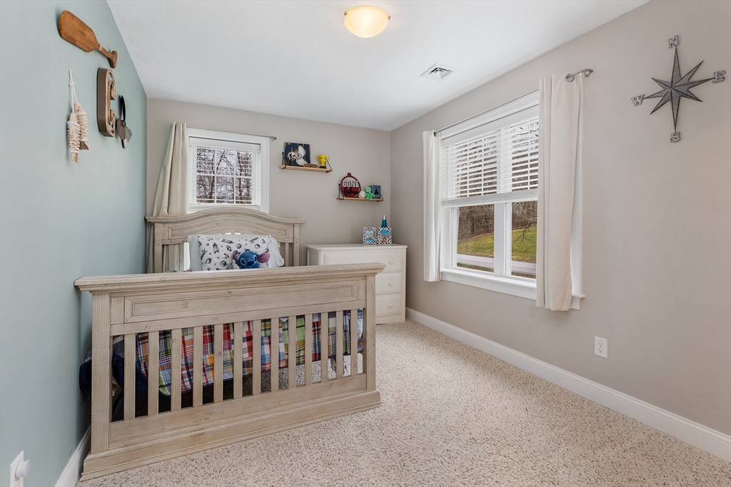 732 Center Street Hanover, MA 02339 - Photo 19 of 38 a bedroom with a bed and a window