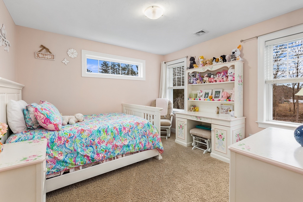 732 Center Street Hanover, MA 02339 - Photo 23 of 38 a bedroom that has a bed and a desk in it