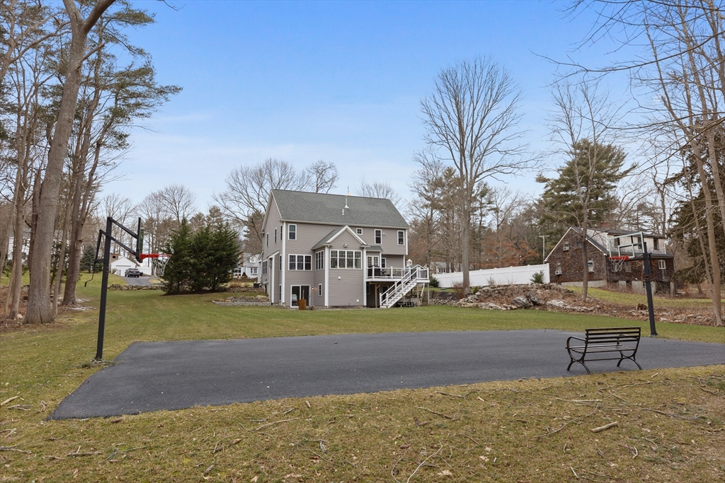 732 Center Street Hanover, MA 02339 - Photo 34 of 38 a view of a house with big yard and large trees