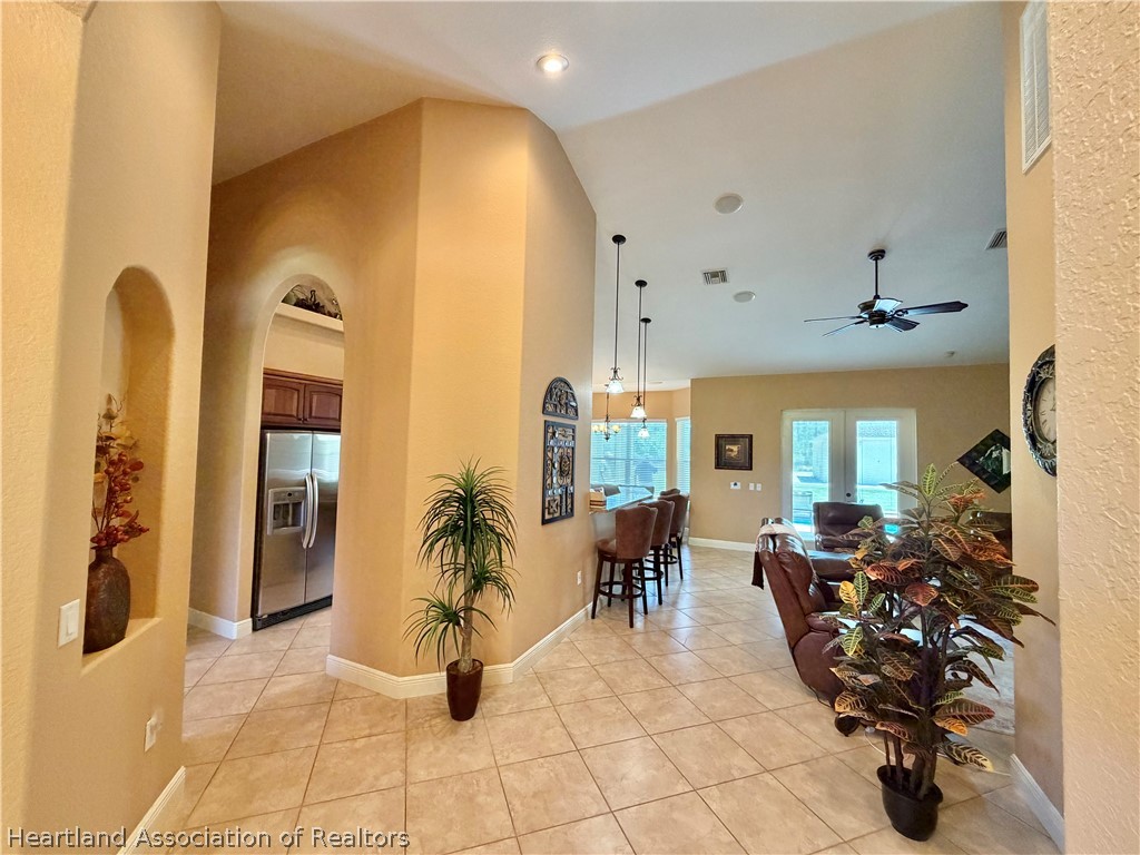 6032 Elm Road Sebring, FL 33875 - Photo 15 of 47 a view of a livingroom with furniture and a window
