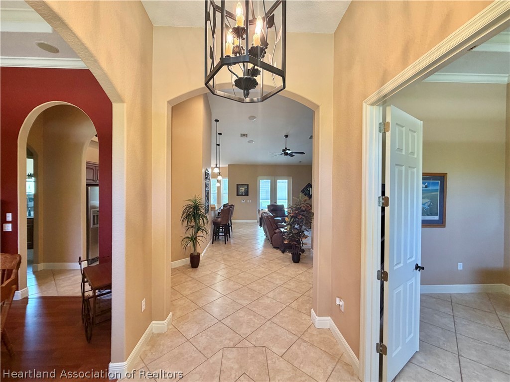 6032 Elm Road Sebring, FL 33875 - Photo 16 of 47 a view of a livingroom with dining space and furniture