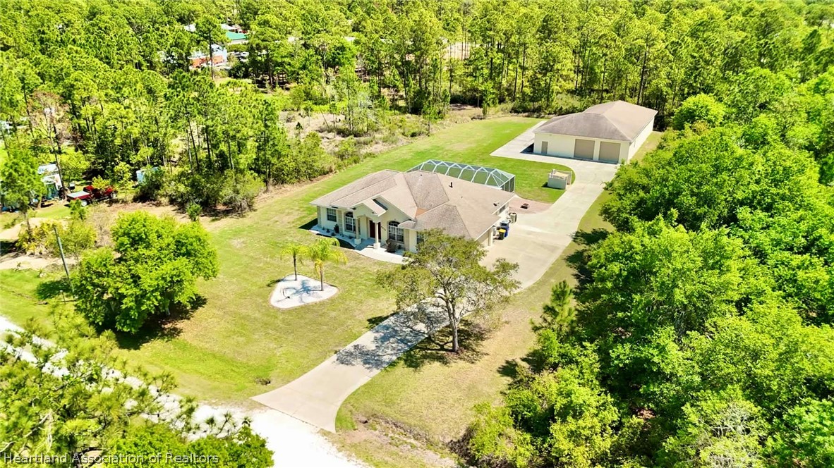 6032 Elm Road Sebring, FL 33875 - Photo 30 of 47 a view of a garden with plants