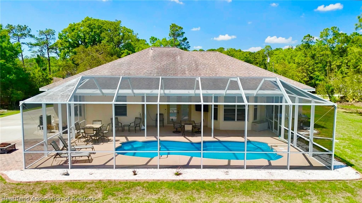 6032 Elm Road Sebring, FL 33875 - Photo 37 of 47 a house view with a garden space
