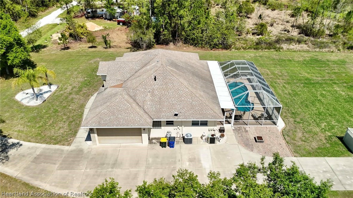 6032 Elm Road Sebring, FL 33875 - Photo 39 of 47 an aerial view of a house with a yard