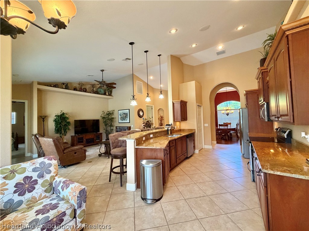 6032 Elm Road Sebring, FL 33875 - Photo 10 of 47 a view of a living room and dining room