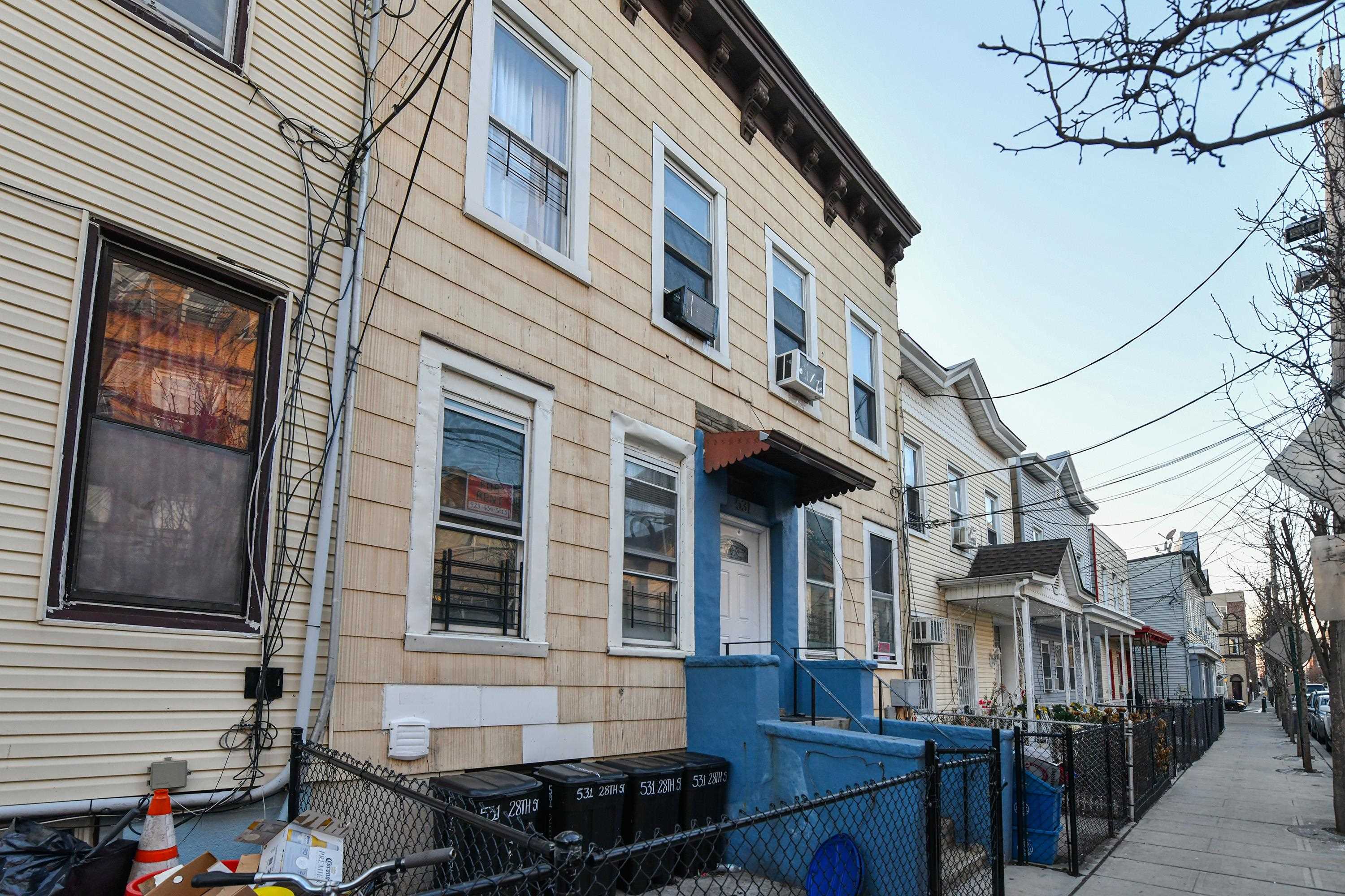 531 28th Street, Unit 2 Union City, NJ 07087 - Photo 24 of 25 a front view of a building with glass windows