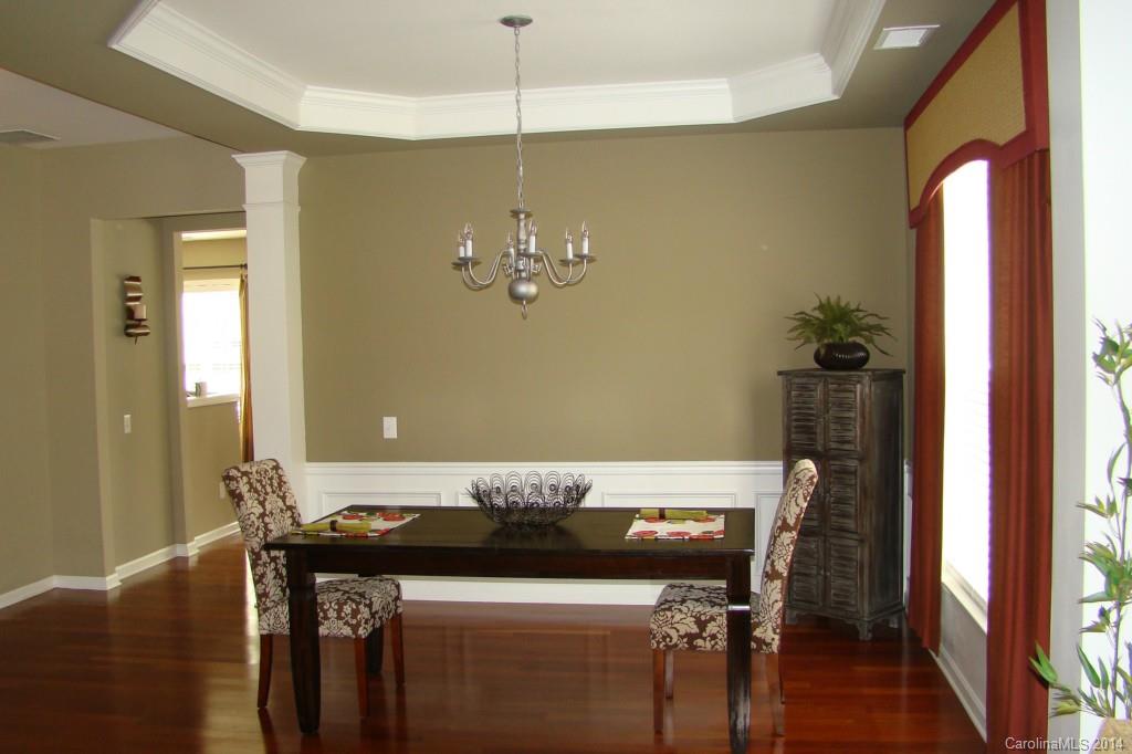 2204 Coltsgate Road Waxhaw, NC 28173 - Photo 3 of 15 a kitchen with a table and chairs