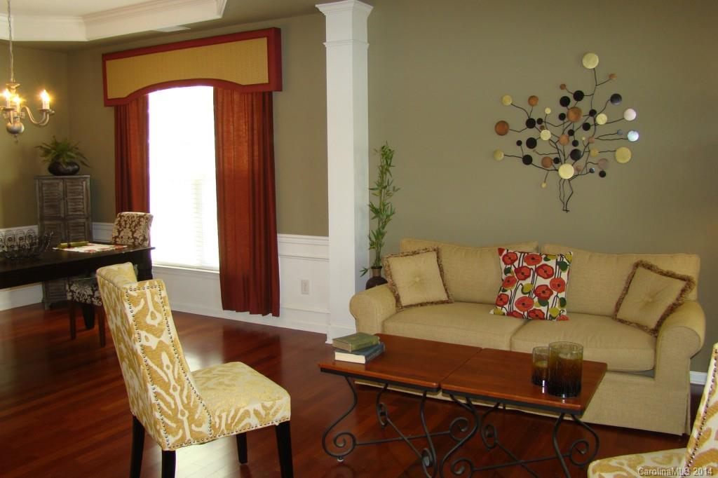 2204 Coltsgate Road Waxhaw, NC 28173 - Photo 4 of 15 a living room with furniture and wooden floor
