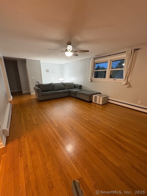 26 Lamphere Road Waterford, CT 06385 - Photo 5 of 14 a view of a room with wooden floor