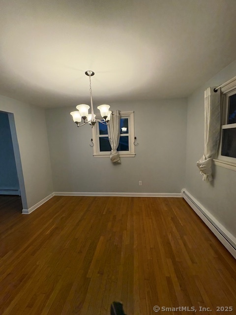 26 Lamphere Road Waterford, CT 06385 - Photo 6 of 14 a view of a room with wooden floor and ceiling fan