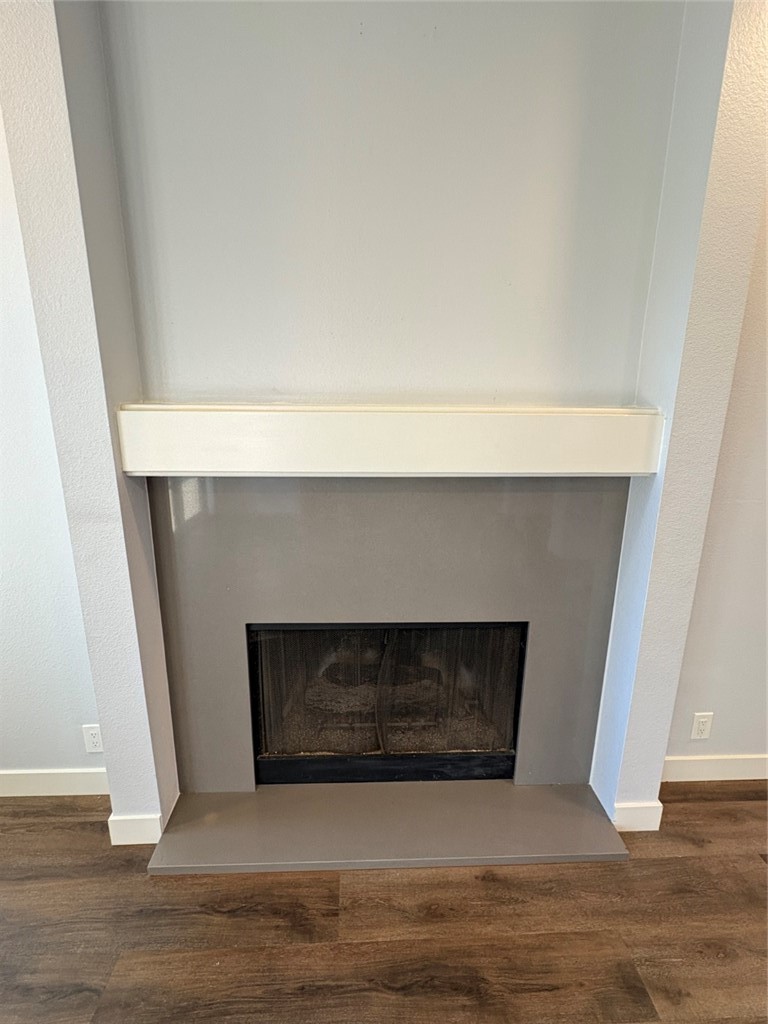 7 Rainbow, Unit 4 Irvine, CA 92603 - Photo 11 of 31 a living room with a fireplace