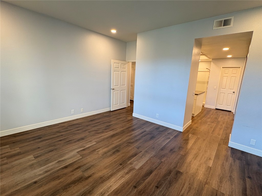 7 Rainbow, Unit 4 Irvine, CA 92603 - Photo 21 of 31 a view of empty room with wooden floor