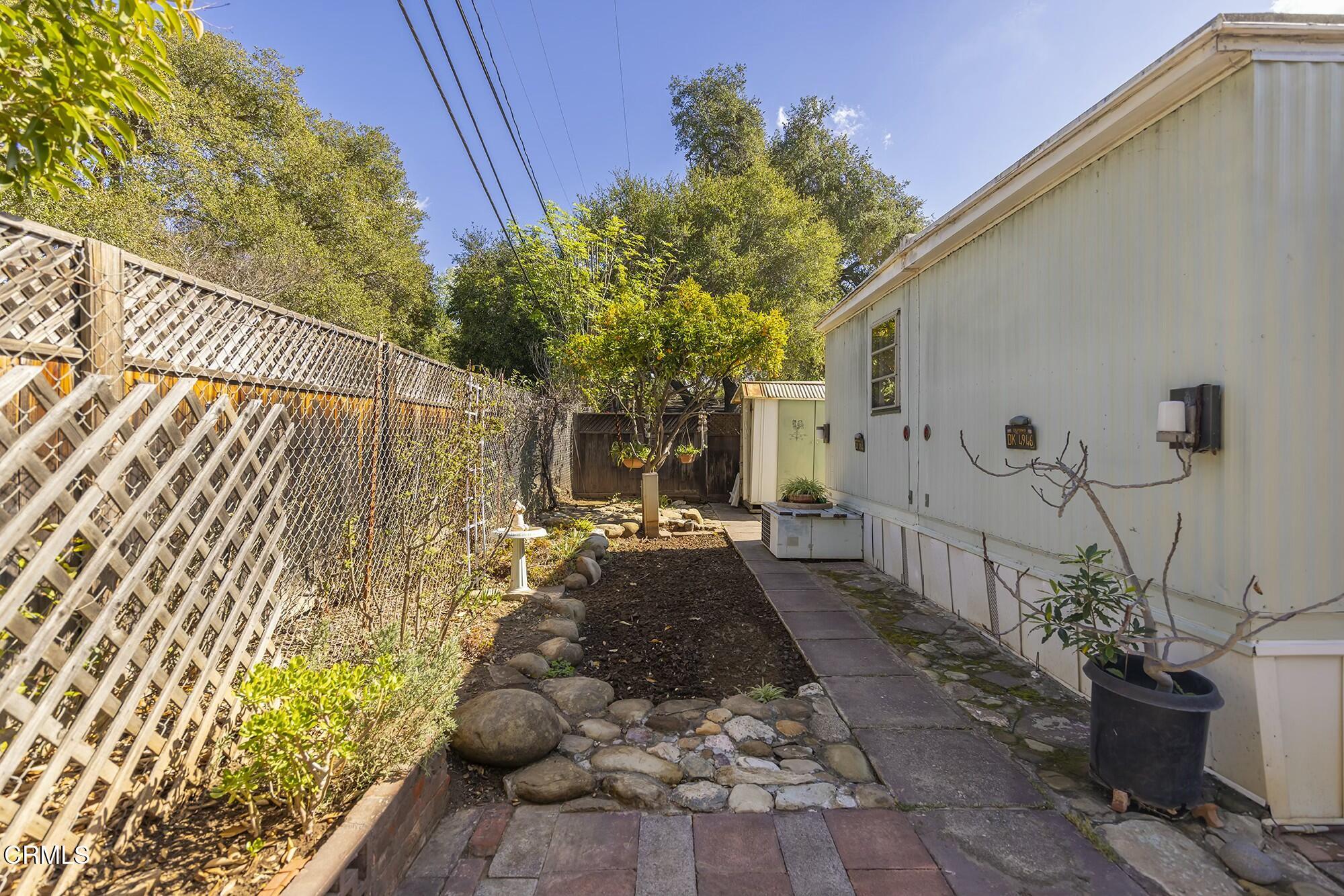 1225 South Rice Road, Unit 6 Ojai, CA 93023 - Photo 13 of 21 a view of a backyard with sitting area