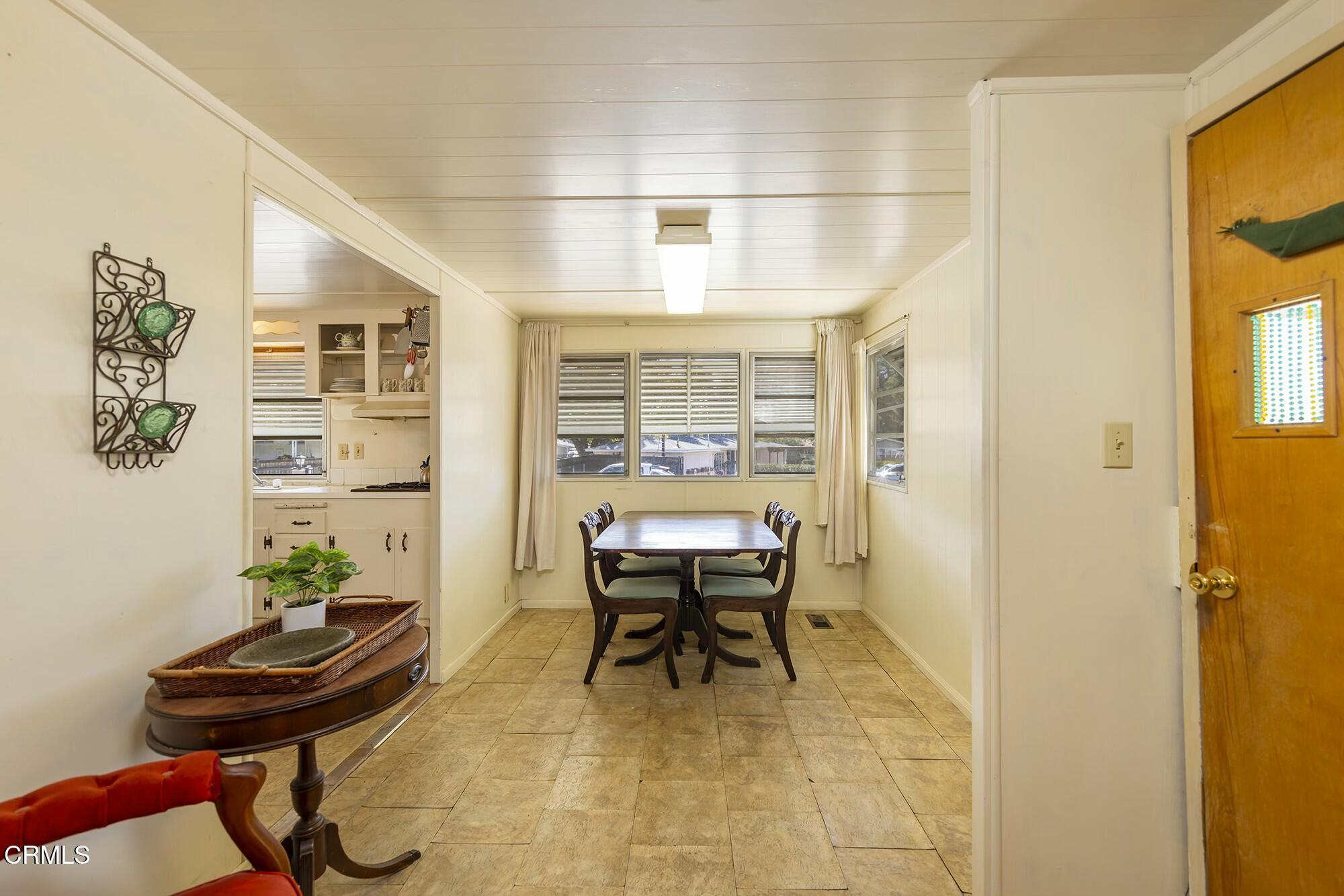 1225 South Rice Road, Unit 6 Ojai, CA 93023 - Photo 7 of 21 a view of a dining room with furniture and a window