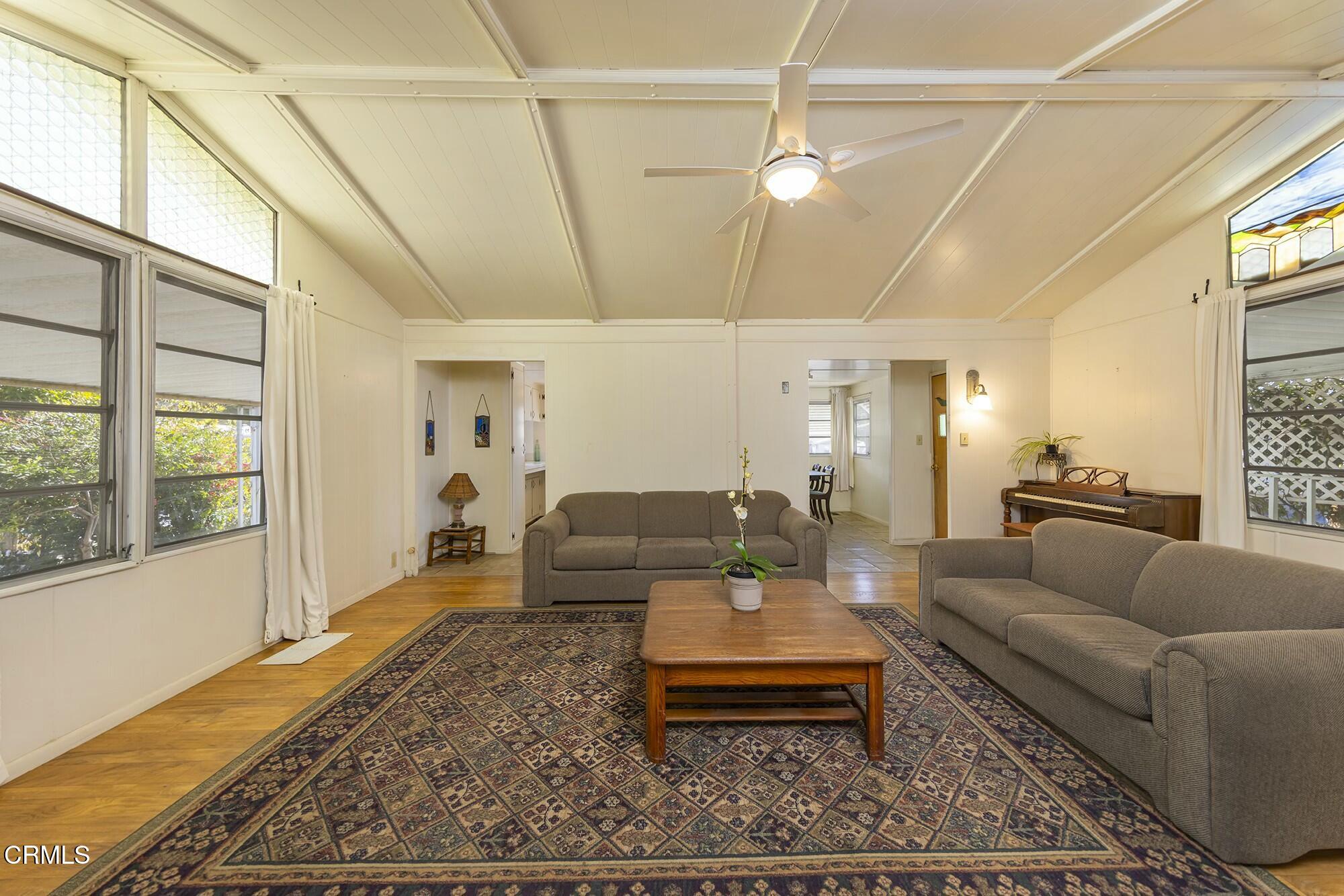 1225 South Rice Road, Unit 6 Ojai, CA 93023 - Photo 8 of 21 a living room with furniture wooden floor and a table