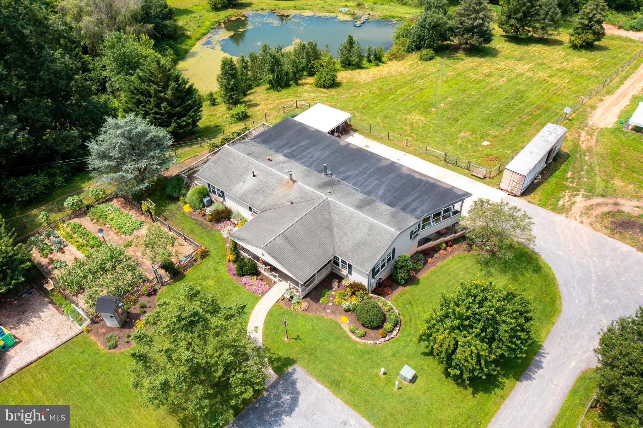 8486 Elizabethtown Road Elizabethtown, PA 17022 - Photo 2 of 58 an aerial view of a house with a yard
