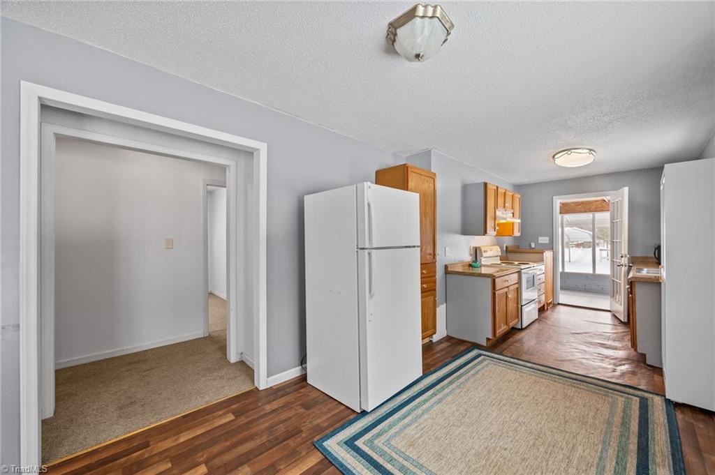 6416 Patterson Road Snow Camp, NC 27349 - Photo 7 of 32 Kitchen/Hallway/Side Porch