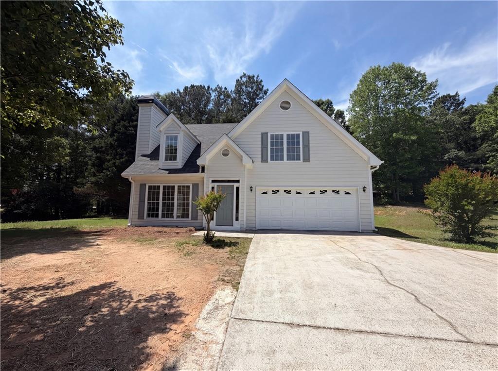 722 Ridgetop Road Bethlehem, GA 30620 - Photo 1 of 23 a front view of a house with a yard