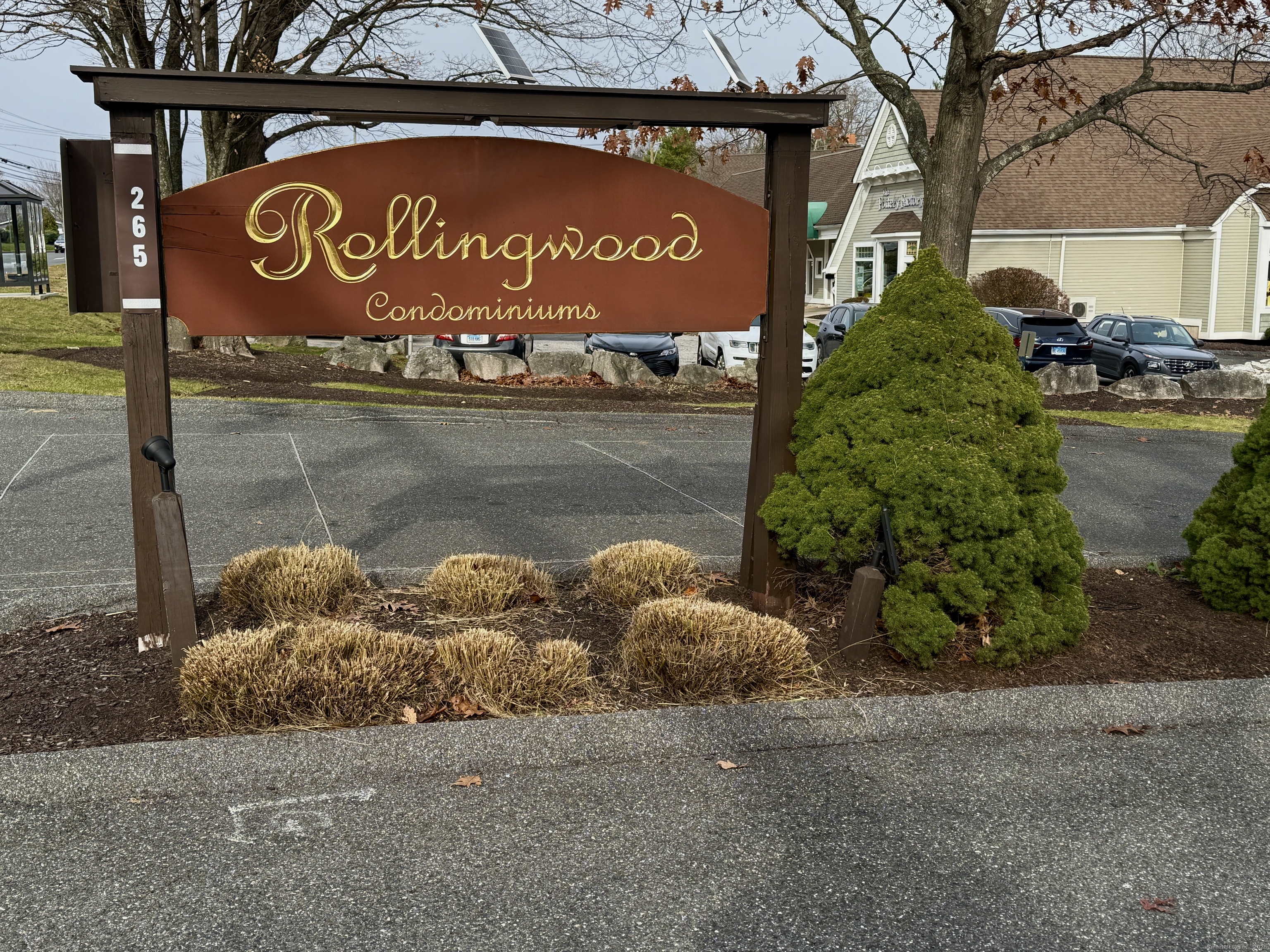 a sign on the side of a street