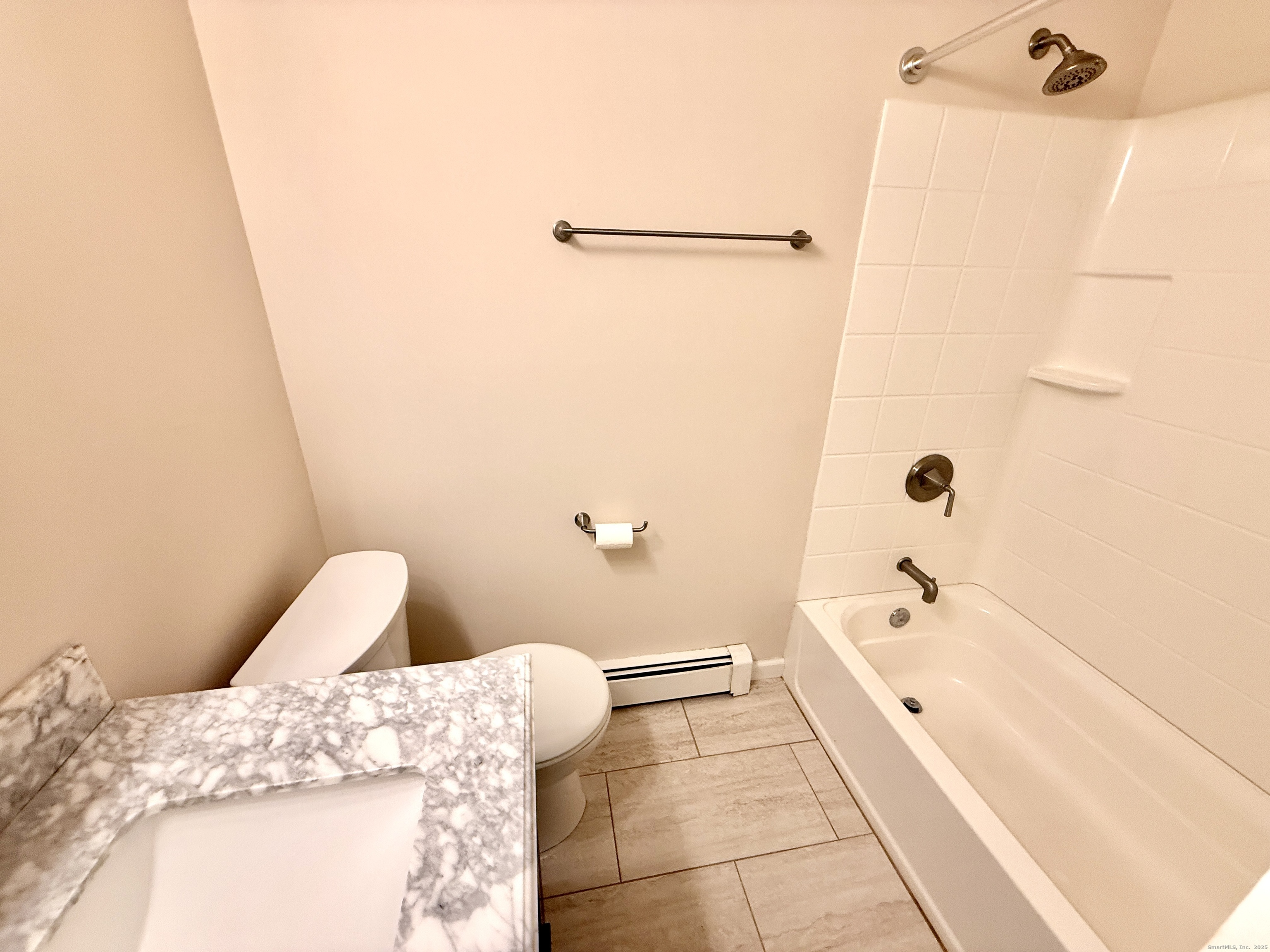 17 Rollingwood Drive, Unit 17 Brookfield, CT 06804 - Photo 12 of 13 a bathroom with a bathtub and toilet