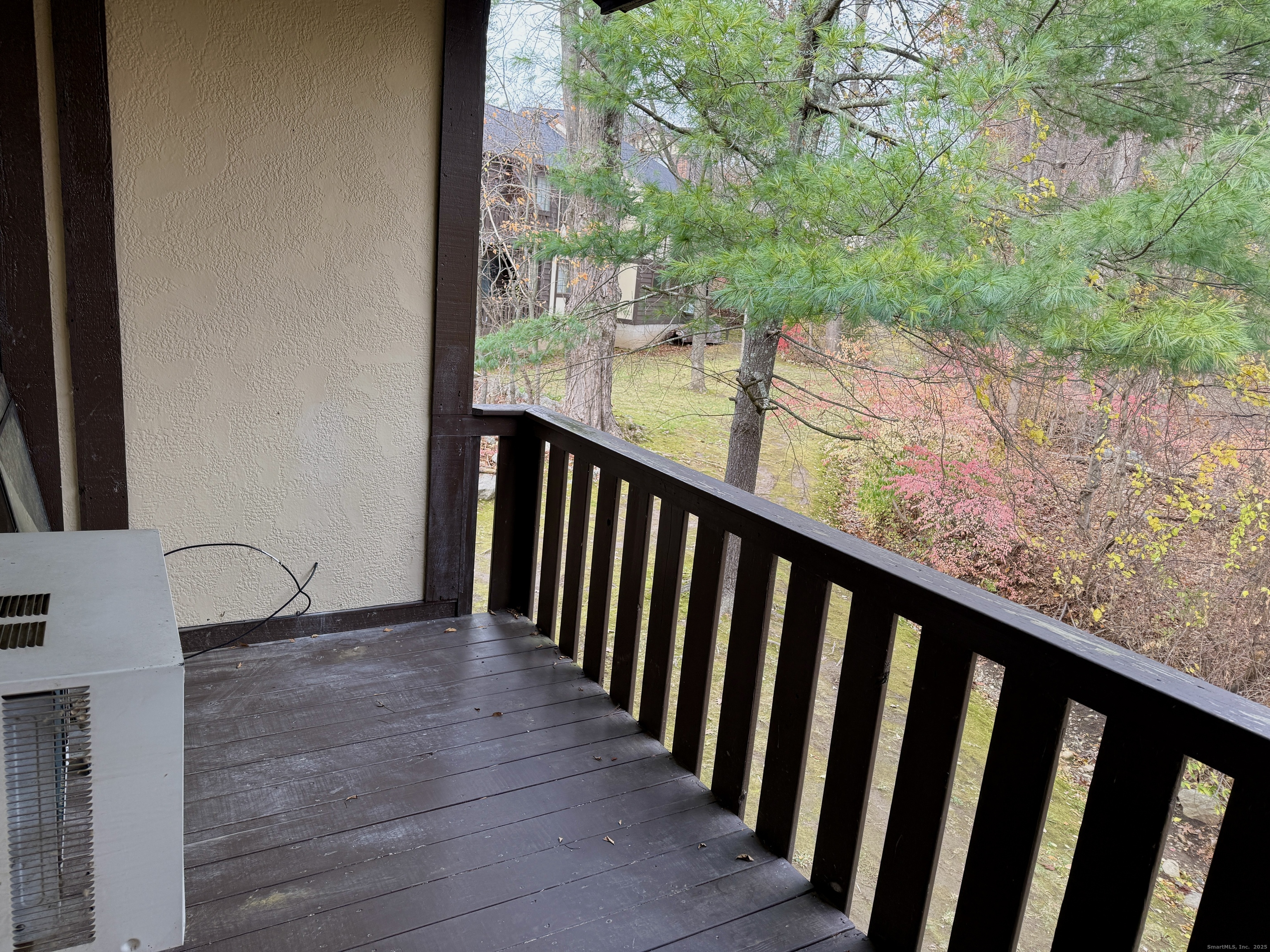 17 Rollingwood Drive, Unit 17 Brookfield, CT 06804 - Photo 13 of 13 a view of a balcony with wooden floor and fence