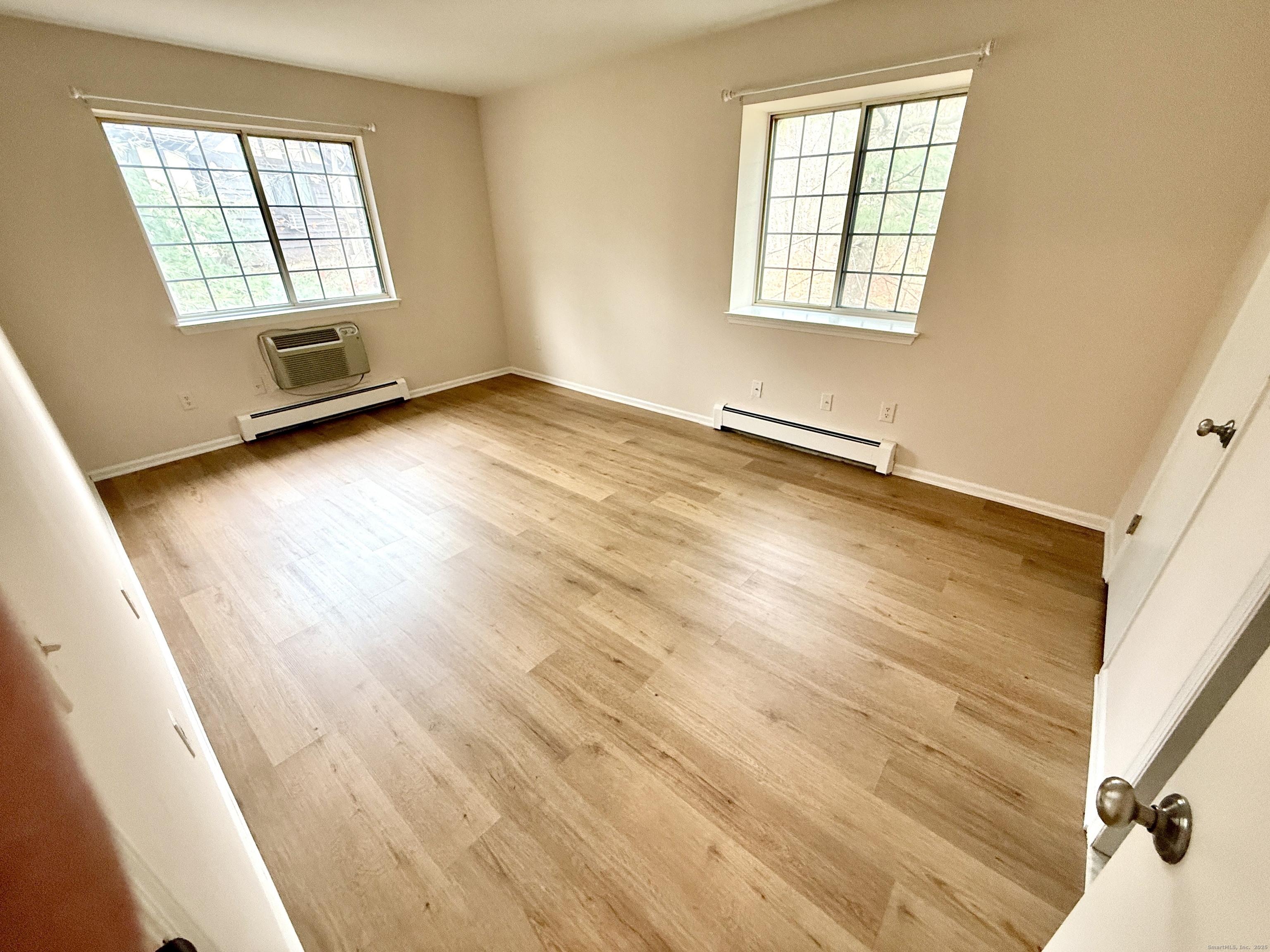17 Rollingwood Drive, Unit 17 Brookfield, CT 06804 - Photo 10 of 13 an empty room with windows