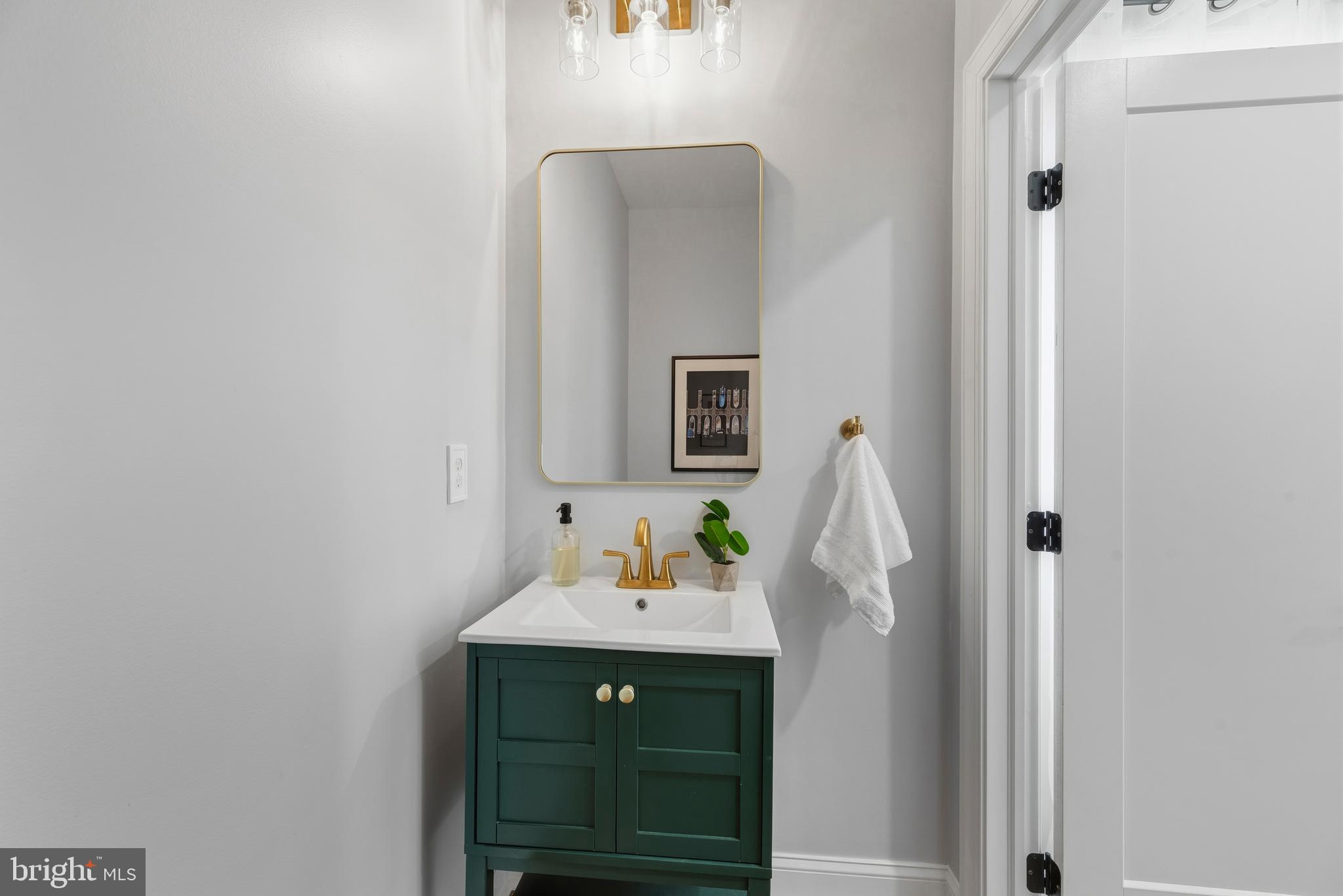 3675 1st Avenue Edgewater, MD 21037 - Photo 26 of 61 Powder room next to laundry